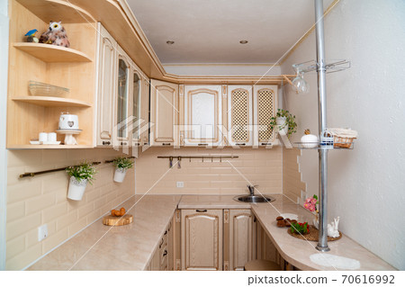 small bright and cozy kitchen. interior small bright and cozy kitchen. interior 70616992