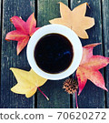 Autumn leaves and coffee 70620272