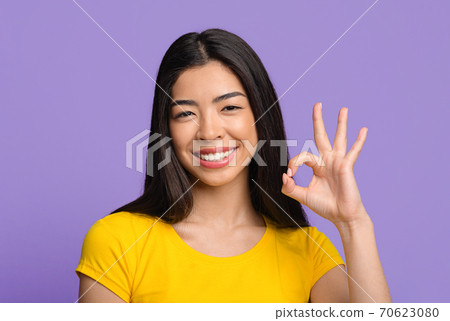 All Is Ok. Joyful Asian Woman Showing Okay Gesture At Camera 70623080