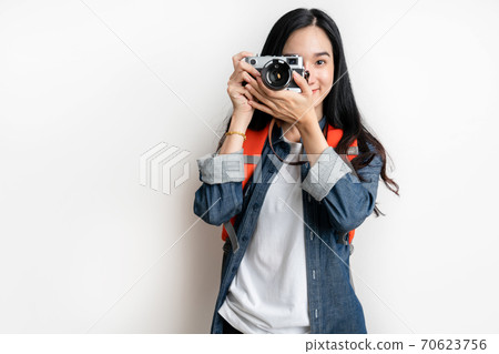 Woman traveler taking photo with clipping path 70623756