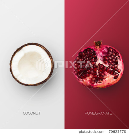 Pomegranate And Coconut Halves Over Maroon Red And White Background Pomegranate And Coconut Halves Over Maroon Red And White Background 70623778