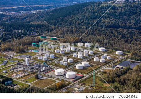 Aerial view of Oil Refinery Industrial Site in a modern city Aerial view of Oil Refinery Industrial Site in a modern city 70624842
