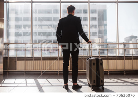 Man preparing to depart from the airport 70626070