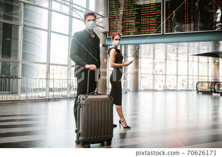 Man and woman having a business trip during the pandemic 70626171