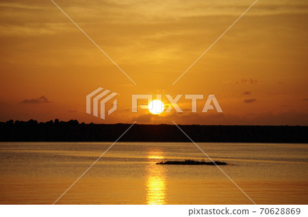 Sunset over Okinawa Kumejima Airport 70628869