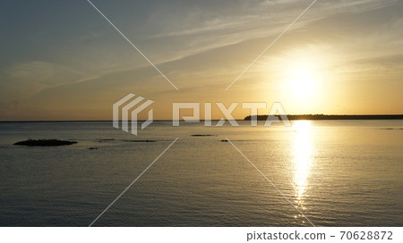 Sunset over Okinawa Kumejima Airport 70628872