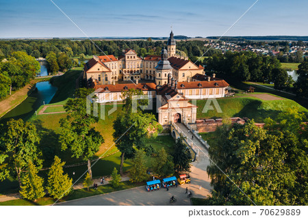 Aerial photo Nesvizh castle in autumn evening, Belarus Minsk, top view Aerial photo Nesvizh castle in autumn evening, Belarus Minsk, top view 70629889