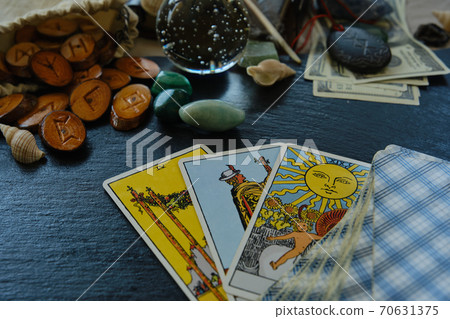 wooden runes from the Tarot card on the table wooden runes from the Tarot card on the table 70631375