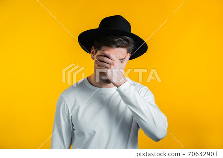 Portrait of young man doing facepalm gesture, like no, I forgot. Unhappy guy feeling sorrow, regret Portrait of young man doing facepalm gesture, like no, I forgot. Unhappy guy feeling sorrow, regret 70632901
