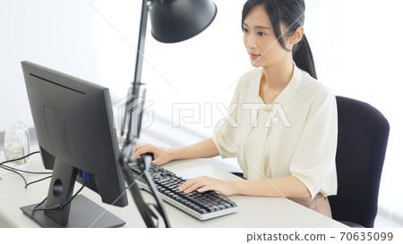 Woman working in the office 70635099