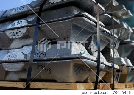 aluminum ingots or billets on a wooden pallet aluminum ingots or billets on a wooden pallet 70635406