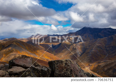 View of Scenic Landscape and Mountains on a Cloudy Day 70636751
