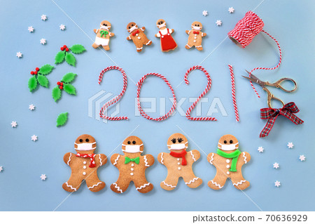 Gingerbread man cookie with a mask 2021 Gingerbread man cookie with a mask 2021 70636929