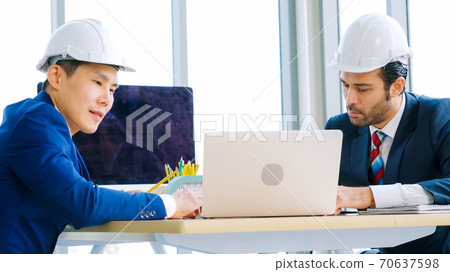 Engineer and architect meeting at office table 70637598