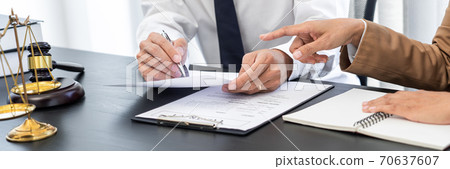 lawyer or judge meeting with client consulting help discussing contract paper agreement. lawyer or judge meeting with client consulting help discussing contract paper agreement. 70637607