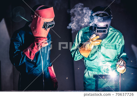 Metal welding steel works using electric arc welding machine Metal welding steel works using electric arc welding machine 70637726