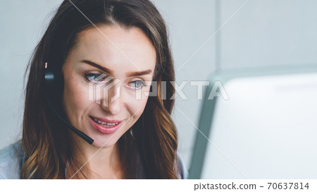 Business people wearing headset working in office 70637814