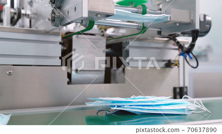 Face mask production line in modern factory 70637890