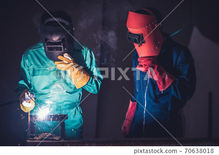 Metal welding steel works using electric arc welding machine 70638018