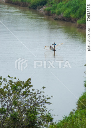 The villagers in the boats find fish in the water as a profession and use it for food The villagers in the boats find fish in the water as a profession and use it for food 70638228
