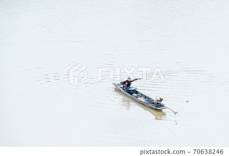 The villagers in the boats find fish in the water as a profession and use it for food The villagers in the boats find fish in the water as a profession and use it for food 70638246