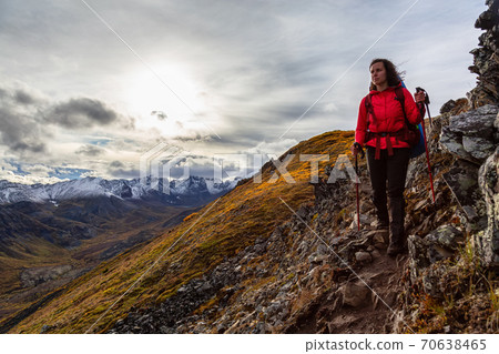 Woman Backpacking in Scenic Mountain Landscape 70638465
