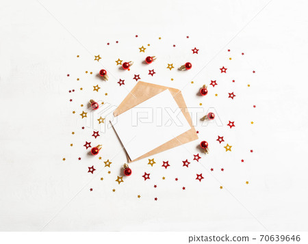 Empty card in craft envelope and various christmas decor Empty card in craft envelope and various christmas decor 70639646