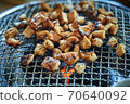 Grilled makchang on a charcoal grill 70640092