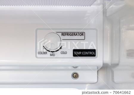 A control of freezer in the fridge, close-up view. Choice of cold in the refrigerator. A control of freezer in the fridge, close-up view. Choice of cold in the refrigerator. 70641662