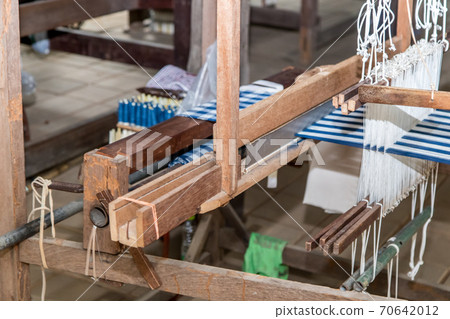 old weaving loom in workshop, Thailand 70642012