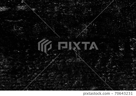 The rough textured surface of the wall is black . Texture or background. The rough textured surface of the wall is black . Texture or background. 70643231
