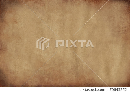 Parchment paper aged by time with burnt edges of yellow color.Texture or background 70643252