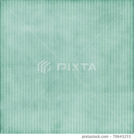 A sheet of green paper with vertical stripes.Texture or background 70643253