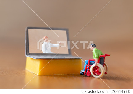 Male patient talk consult with doctor using video call on laptop , online doctor concept Male patient talk consult with doctor using video call on laptop , online doctor concept 70644538