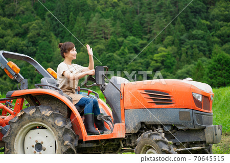 Tractor and women 70645515
