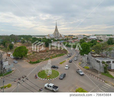 Aerial view of Wat Sothon Wararam or Temple of Dignity, Mueang Cha Choeng Sao District with Chao Phraya River, Cha Choeng Sao urban city downtown skyline, near Bangkok, Thailand. Aerial view of Wat Sothon Wararam or Temple of Dignity, Mueang Cha Choeng Sao District with Chao Phraya River, Cha Choeng Sao urban city downtown skyline, near Bangkok, Thailand. 70645664