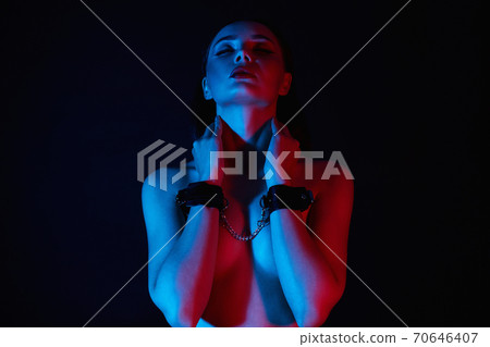 Art portrait of Naked Girl in handcuffs Art portrait of Naked Girl in handcuffs 70646407