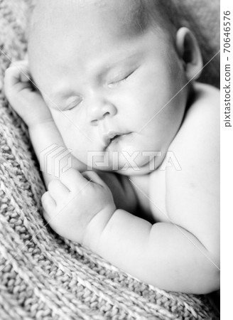 black white. sleeping newborn baby 70646576