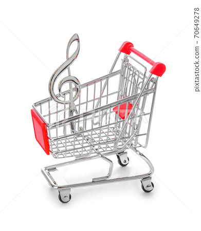 Music treble clef in shopping cart 70649278