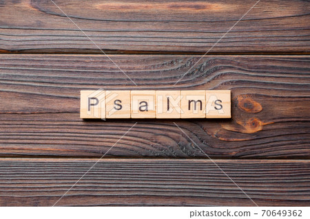 psalms word written on wood block. psalms text on table, concept 70649362
