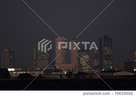 Skyscrapers in front of Nagoya Station at dusk 70650088