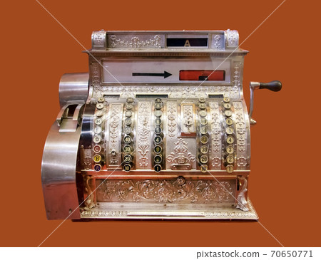 Old-time cash register, isolated on background. Vintage cash register. Old-time cash register, isolated on background. Vintage cash register. 70650771