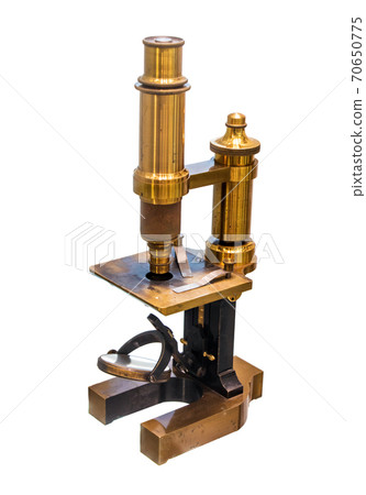 Vintage brass microscope isolated on white background. A monocular microscope from the 19th century. 70650775