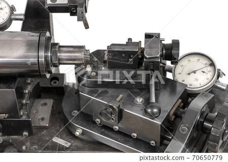 Manually operated lathe for making contact lenses. Manually operated lathe for making contact lenses. 70650779