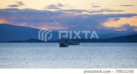 fishing ships at sunset in the Avacha Bay on the Kamchatka Peninsula 70652298