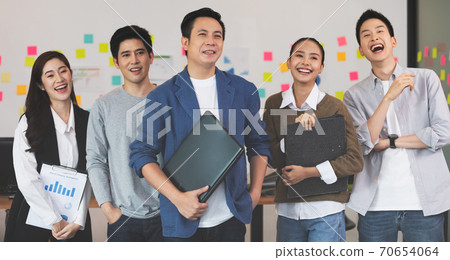 Group of Happy young business Startup coworkers working Brainstorming together to get ideas and marketing plan at office,Business Startup Diversity Concept Group of Happy young business Startup coworkers working Brainstorming together to get ideas and marketing plan at office,Business Startup Diversity Concept 70654064