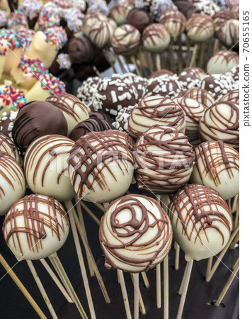 colorful candies and chocolate balls as a background colorful candies and chocolate balls as a background 70655165