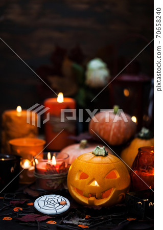 Decorative halloween pumpkins and candles Decorative halloween pumpkins and candles 70658240