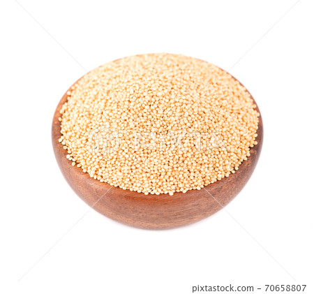 Amaranth seeds in wooden bowl, isolated on white background. Organic dry raw amaranth beans. 70658807