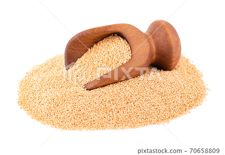 Amaranth seeds in wooden scoop, isolated on white background. Organic dry raw amaranth beans. Amaranth seeds in wooden scoop, isolated on white background. Organic dry raw amaranth beans. 70658809